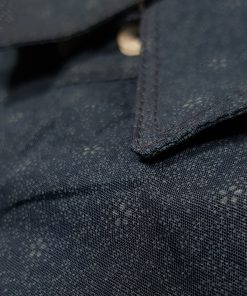 A close-up view of a Men's Slim Fit Casual Shirt in Navy Print